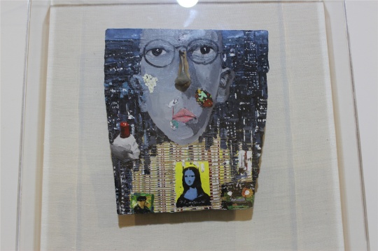 展览的画册题为《王波》，边上一行小字：我，自己
