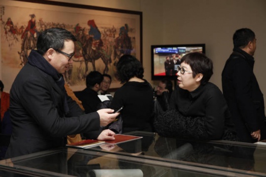 收藏家唐炬与北京保利拍卖总经理李达
