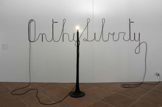 On the Liberty 1990 Mixed media installation Lamp: 170 x 30 x 30 cm / 66 7/8 x 11 3/4 x 11 3/4 in Writing: 67 x 354 cm / 26 3/8 x 139 3/8 in
© Estate of Fabio Mauri Courtesy Estate of Fabio Mauri and Hauser & Wirth
On the Liberty 1990 Mixed media installation Lamp: 170 x 30 x 30 cm / 66 7/8 x 11 3/4 x 11 3/4 in Writing: 67 x 354 cm / 26 3/8 x 139 3/8 in
© Estate of Fabio Mauri Courtesy Estate of Fabio Mauri and Hauser & Wirth