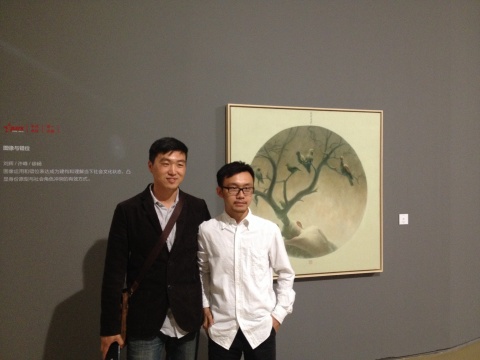 策展人汤宇(右)
策展人汤宇(右)